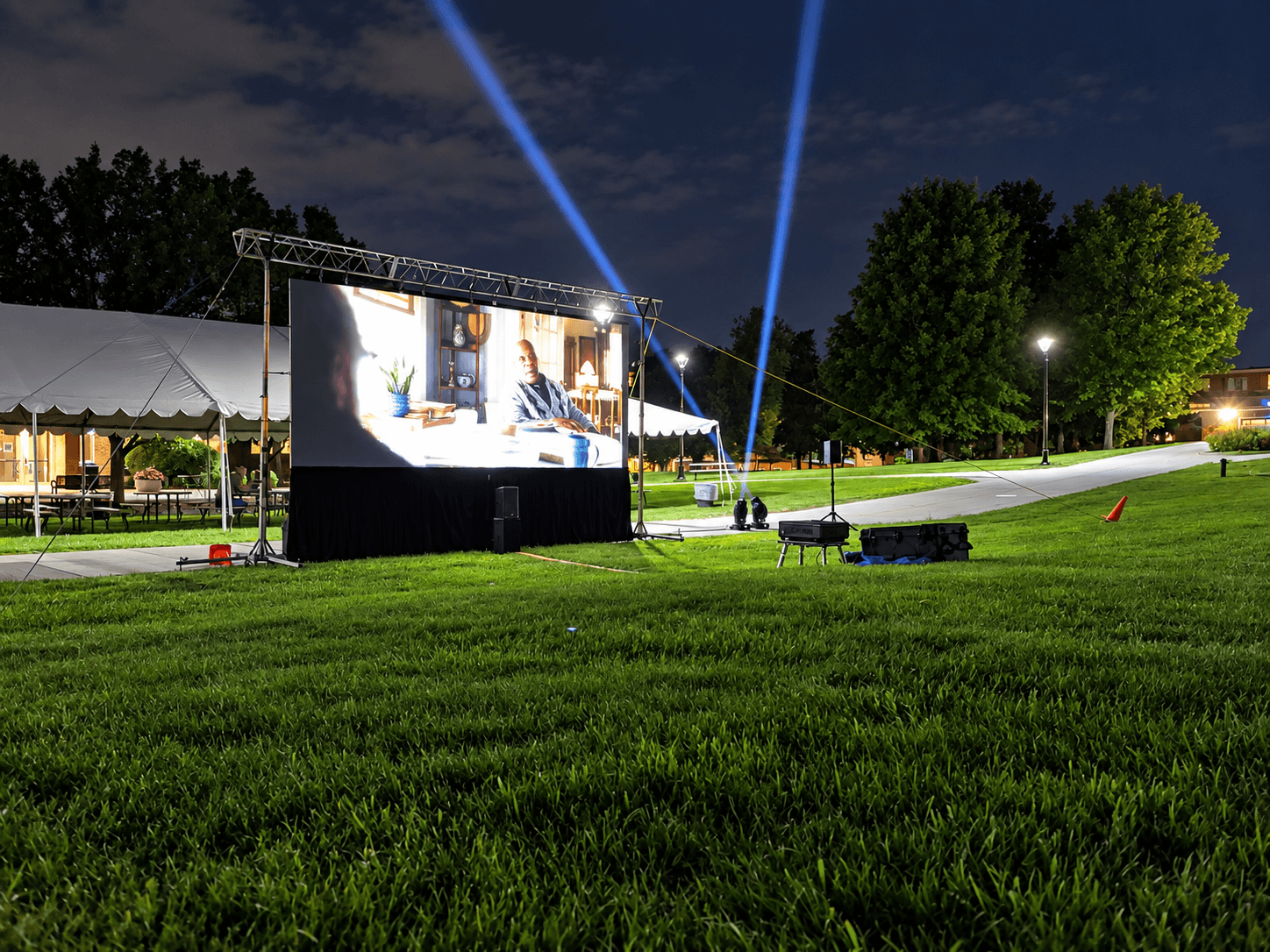 Outdoor projector displaying brand content